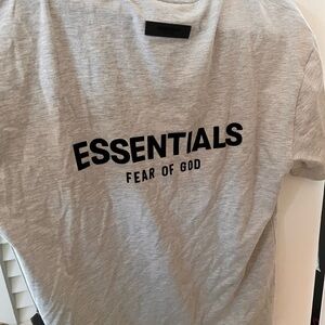 Fear of god essentials t shirt. New w tags. Never worn.